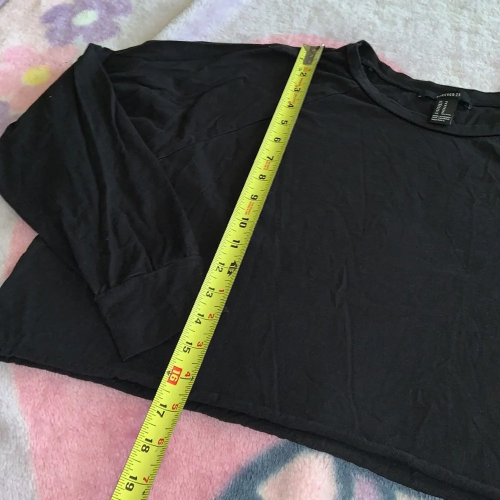 Forever 21 black long sleeve cropped cutoff saying tee “ Less is the new more “ - Picture 4 of 5